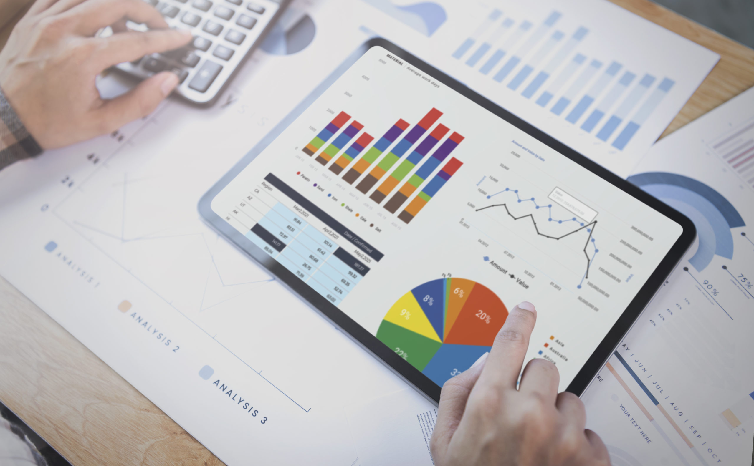 businesswoman using a tablet to analysis graph company finance strategy statistics success concept and planning for future in office room scaled