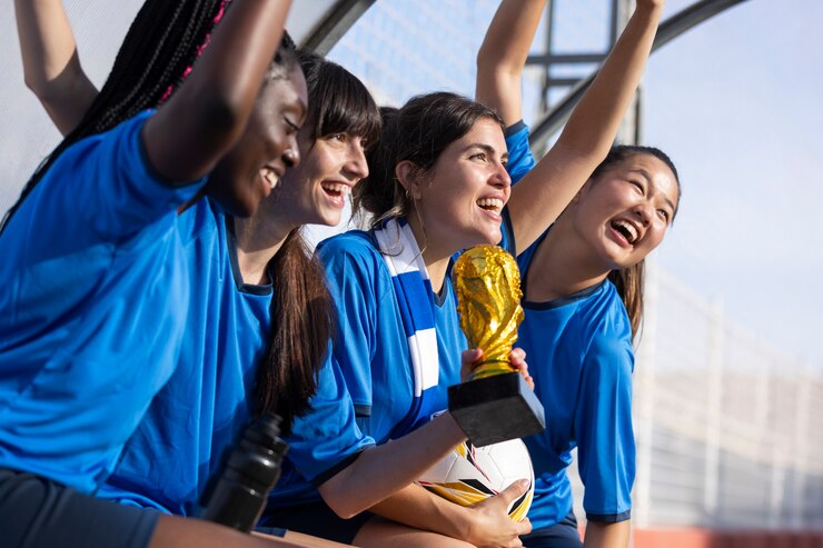 team celebrating win silver cup